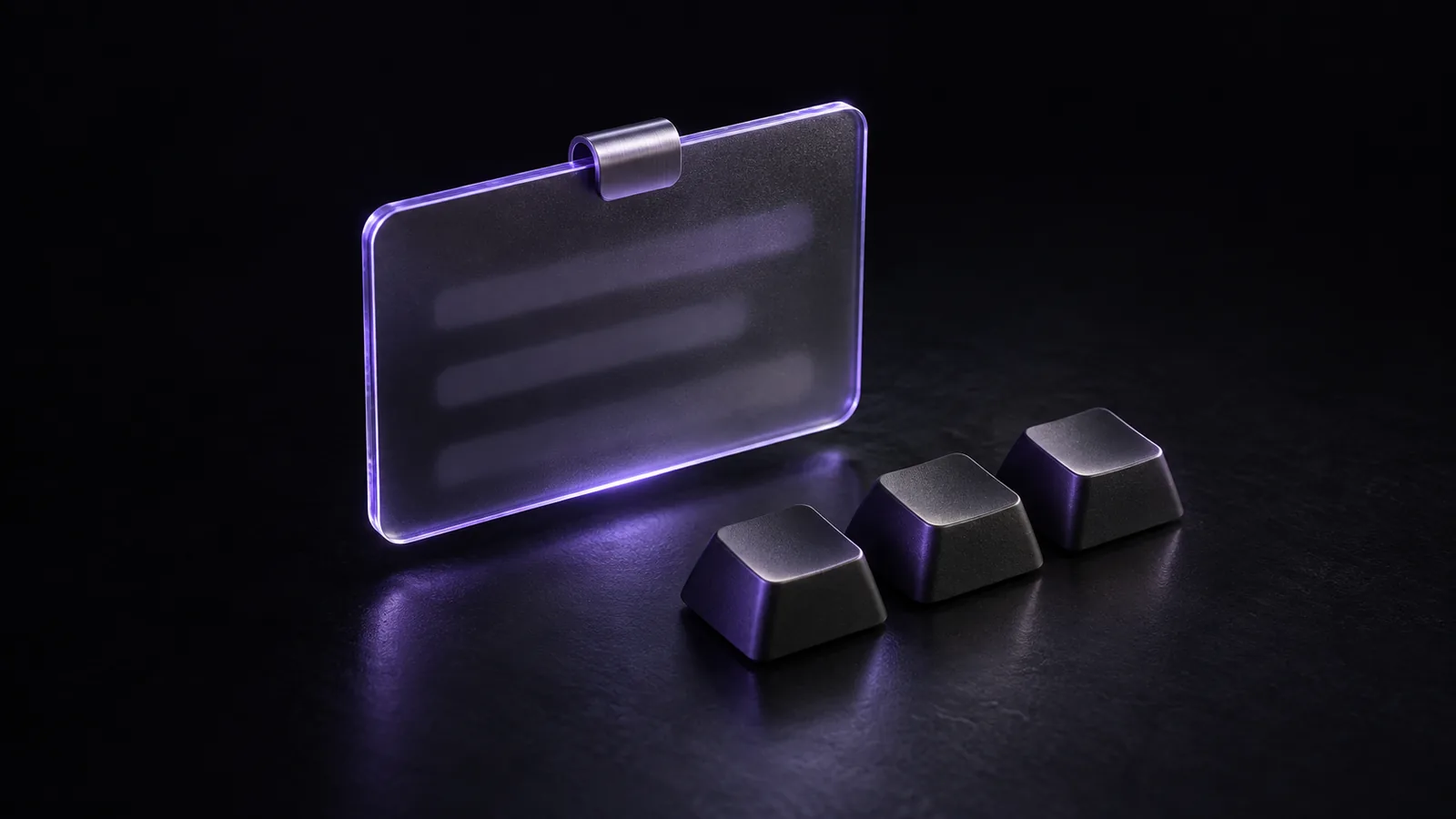 Illustration: a glass pane held by a clasp next to three blank keycaps.