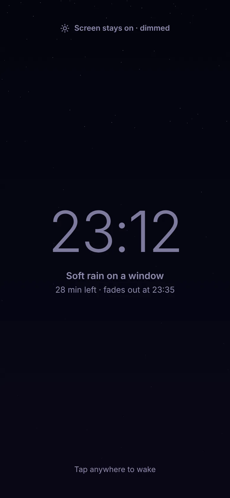 Relaaax night clock: dim 23:12 with Soft rain on a window, 28 minutes left